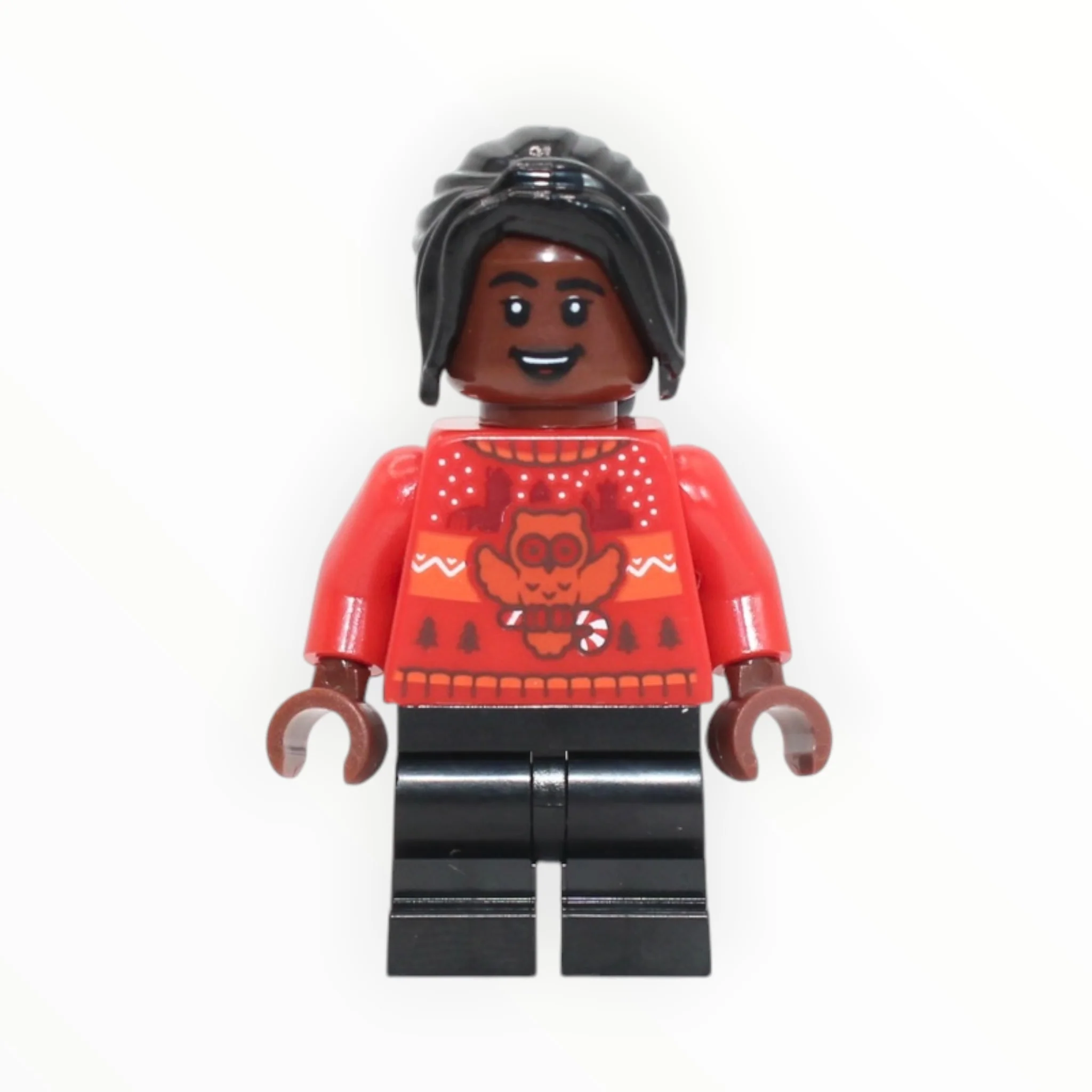 Angelina Johnson (red holiday sweater, 2025)